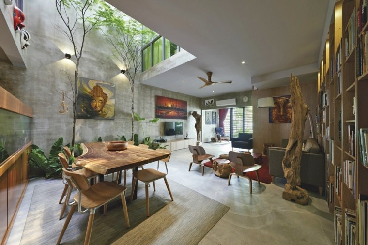 Maison avec patio et arbre d'intérieur par O2 Design Atelier