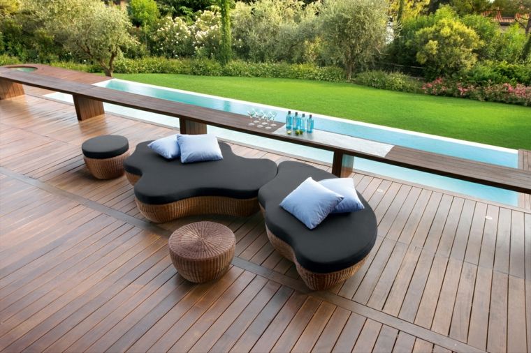 mobilier design jardin canapé résine tressée coussins table ronde