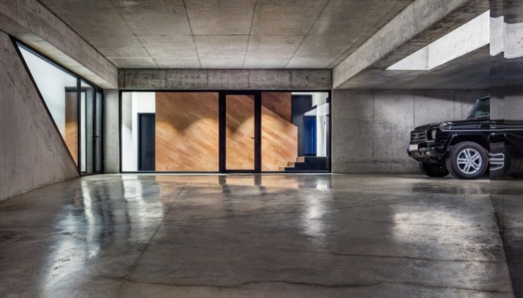 maison design garage moderne porte bois béton cire sol
