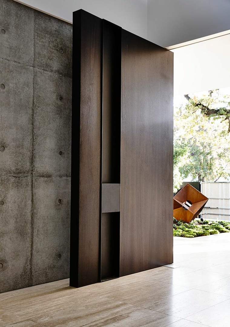 porte d'entrée matériaux naturels design workroom moderne intérieur mur béton 