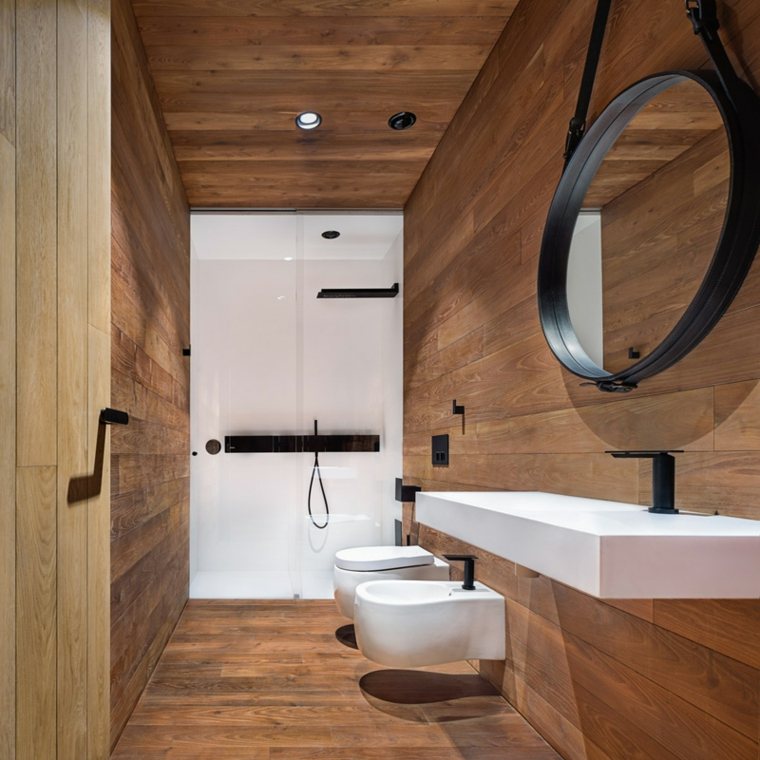 maison d'architecte design salle de bains bois toilettes lavabo miroir rond 