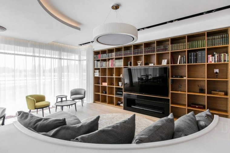 appartement contemporain moderne salon canapé bibliothèque bois coussins