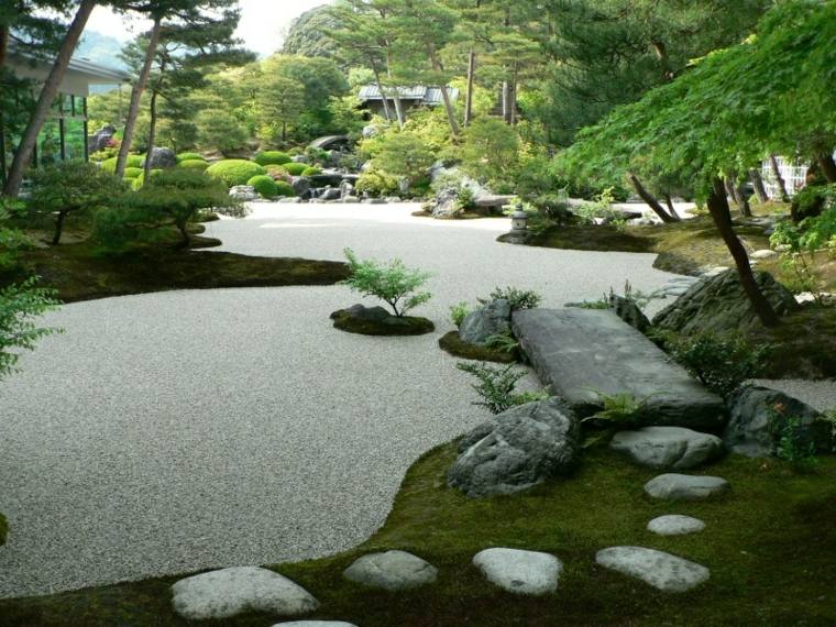 jardin zen aménager rochers blanches sable 