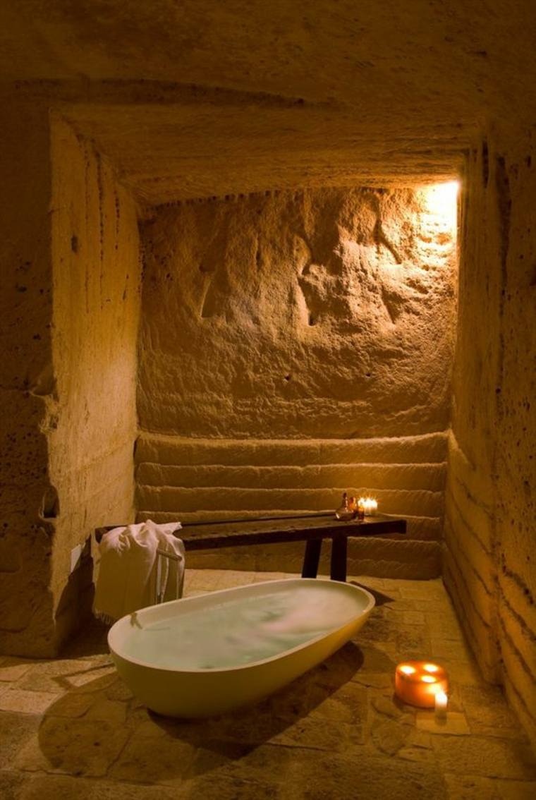 salle de bain en pierre naturelle baignoire moderne bougies 