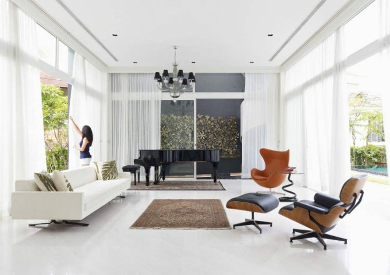 topos design studio design moderne tapis sol canapé blanc coussins pouf fauteuil luminaire