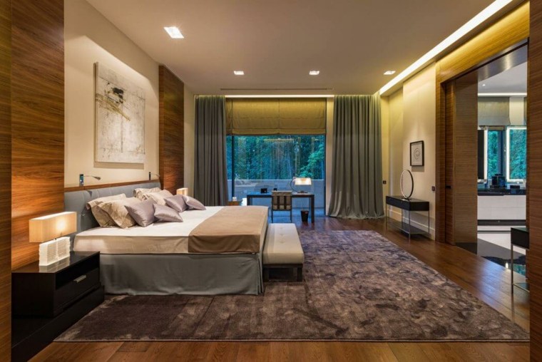 chambre moderne lit coussins tapis sol décorer mur cadres