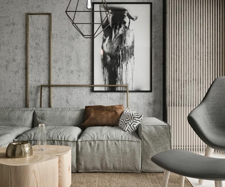 salon moderne style industriel canapé gris coussins tableau mur fauteuil table basse bois