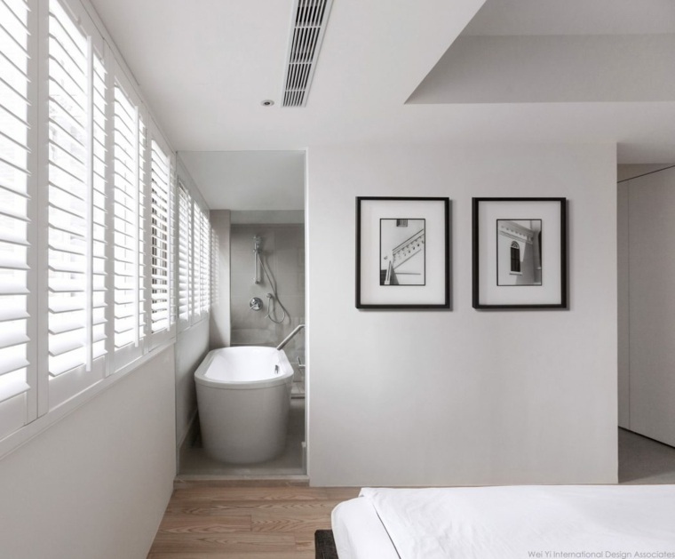baignoire design cadres décor salle de bain ouverte baignoire chambre