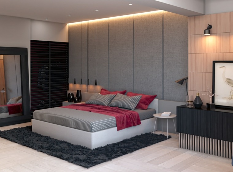 chambre à coucher grise avec une tapisserie et un tapis aux nuances gris et rose