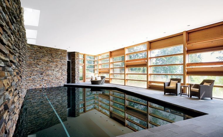 piscine intérieur mur pierre idee parement