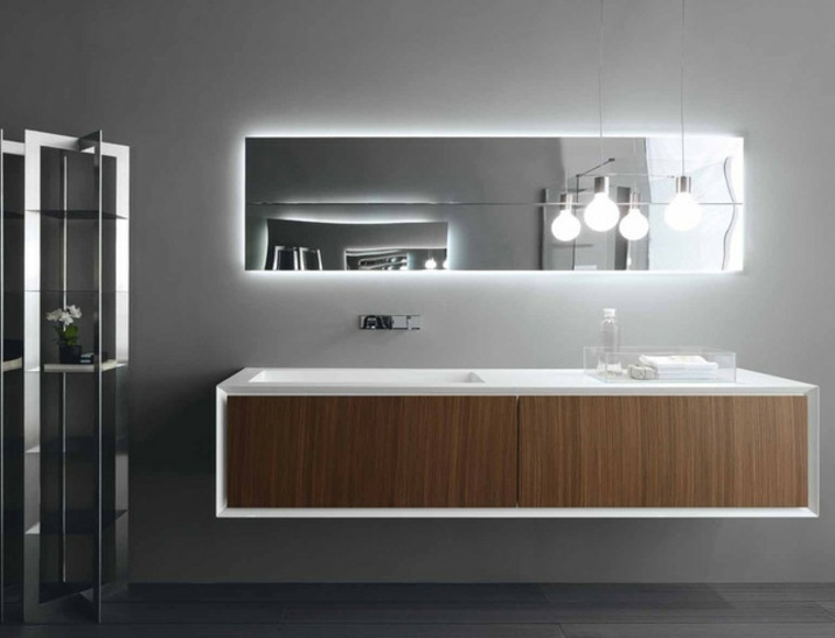 salle de bains béton ciré meuble bois miroir design luminaires