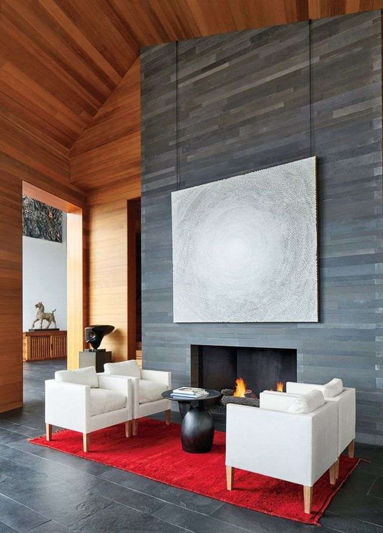 déco chalet de montagne cheminee design moderne coin lecture meuble blanc tapis rouge