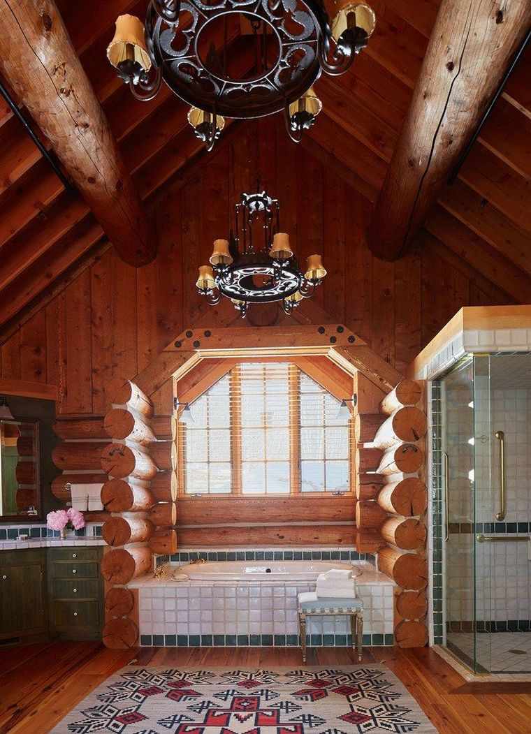 chalet de montagne deco salle de bain poutres mur parement bois