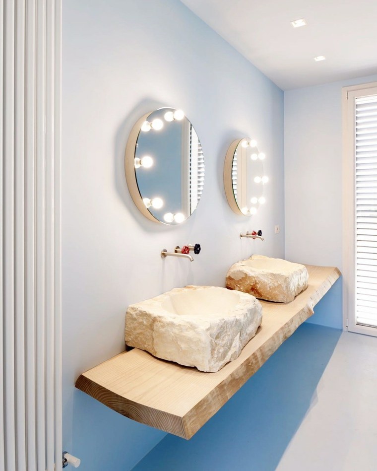 idée salle de bains lavabo pierre calcaire bois miroir rond mur