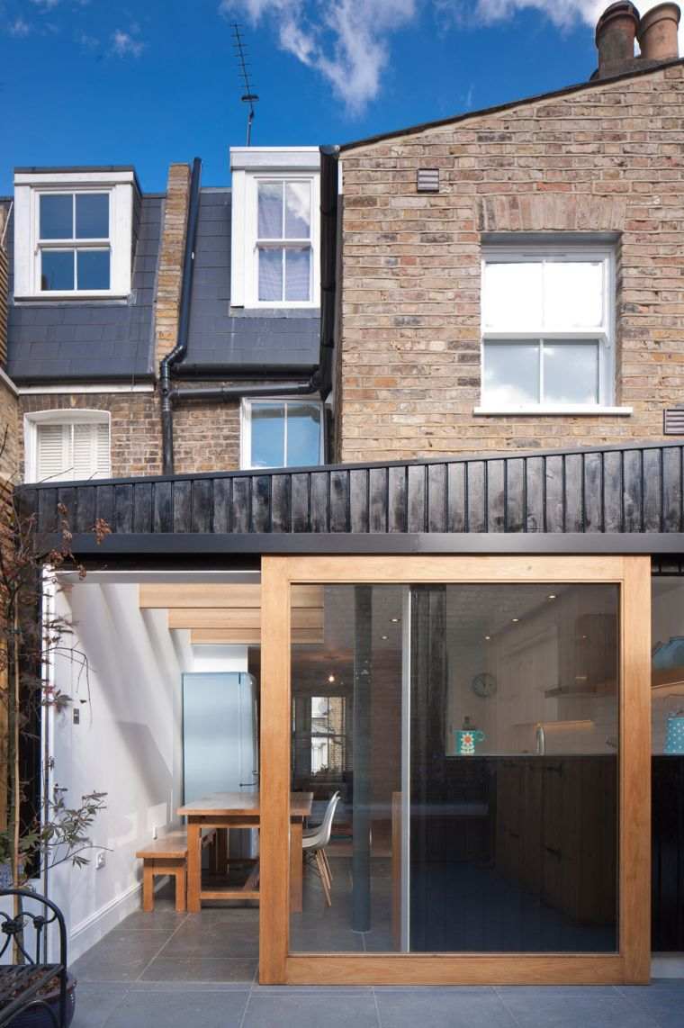 idee pour agrandir sa maison brique baie vitree coulissante facade bois 