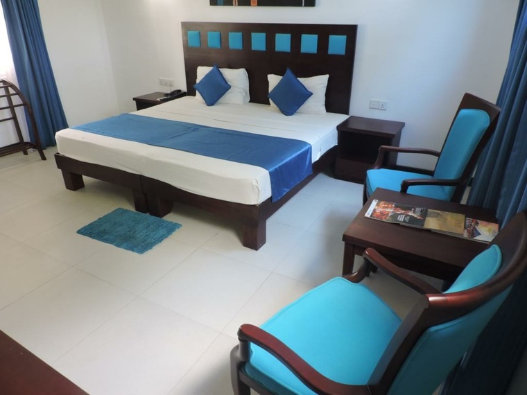 chambre bleu canard simplicité minimalisme idéal hôtel