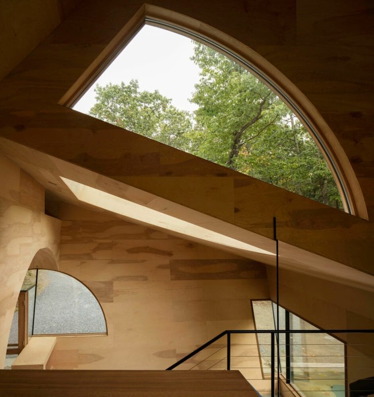 architecture organique maison bois design moderne intérieur acajou