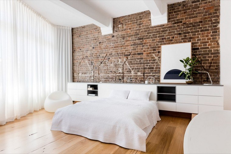 chambre à coucher blanche idée tête de lit rangement mur briques