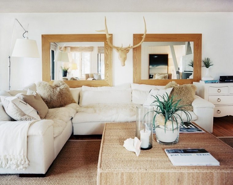 intérieur salon design canapé blanc coussins table basse plante idée