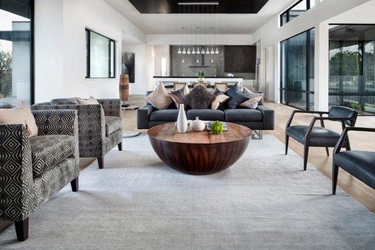 salon contemporain table basse design tapis de sol fauteuil coussins