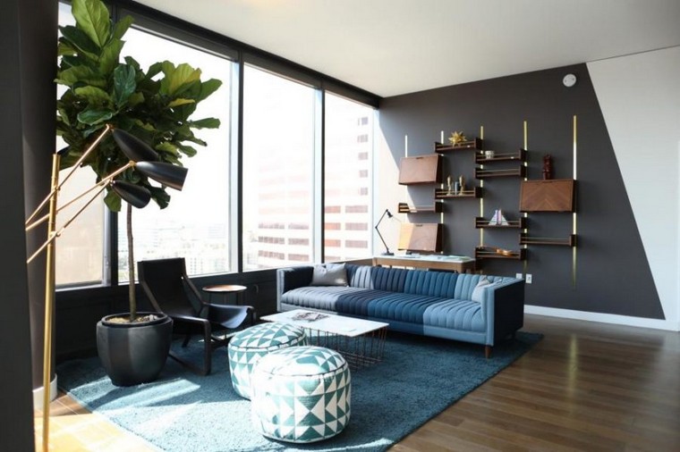 salon bleu design pouf moderne idée déco tapis de sol tendance bois