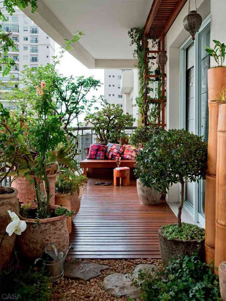 revêtement sol terrasse bois idée déco plantes en pot design extérieur 