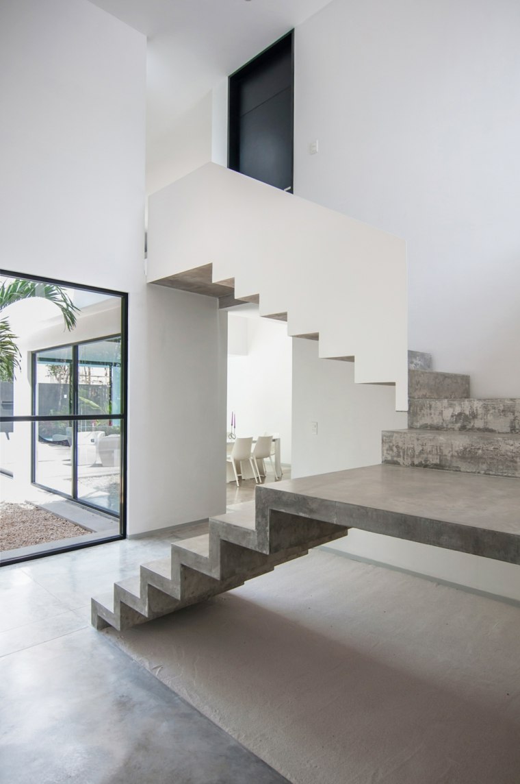 escalier-moderne-demi-tournant-marches-beton-maison-design