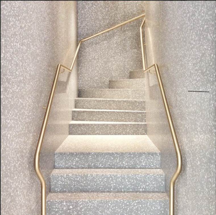 escalier-moderne-pierre-main-courante-cuivre-idee-deco-interieur