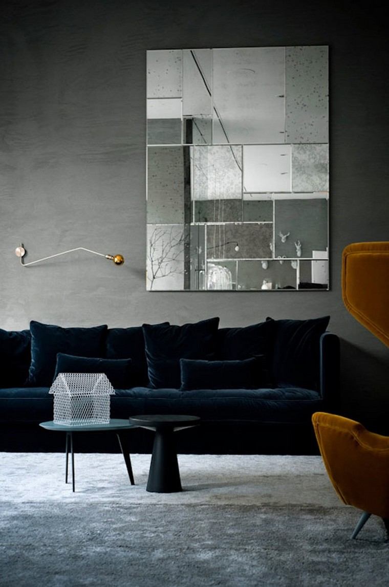 design contemporain idée canapé noir coussins tableau déco mur fauteuil oeuf