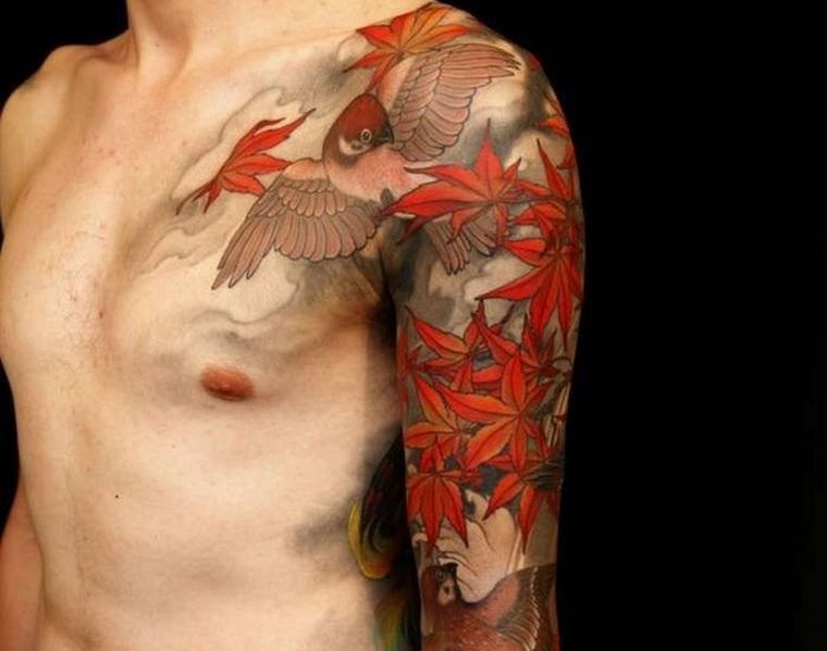 feurs-tatouage-bras-feuilles-mortes-oiseauèhomme