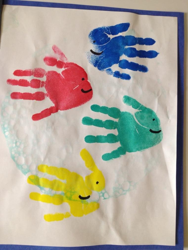 poissons-couleurs-enfant-mains