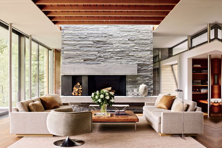 cheminée moderne parement-pierre-grise-meubles-salon-beige