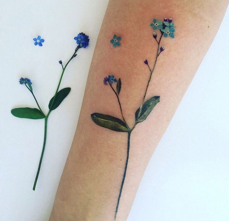 tatouage bras femme fleur delicat art design tattoo