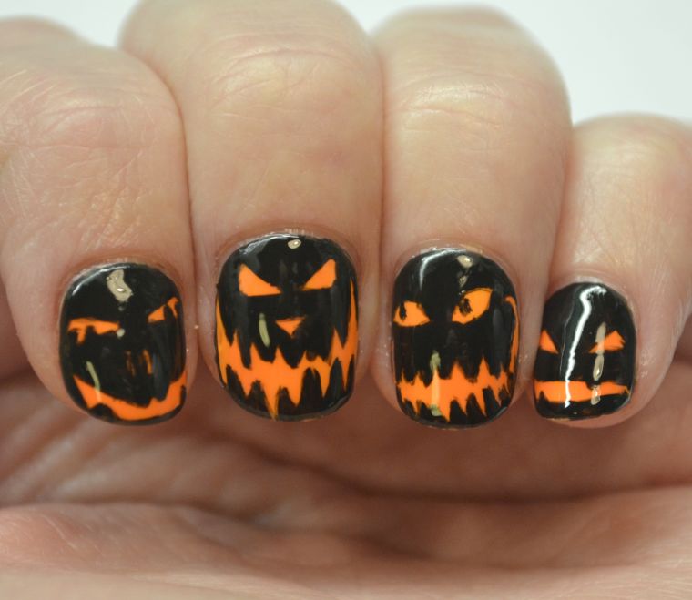 nail art halloween citrouille-vernis-ongles-noir-orange
