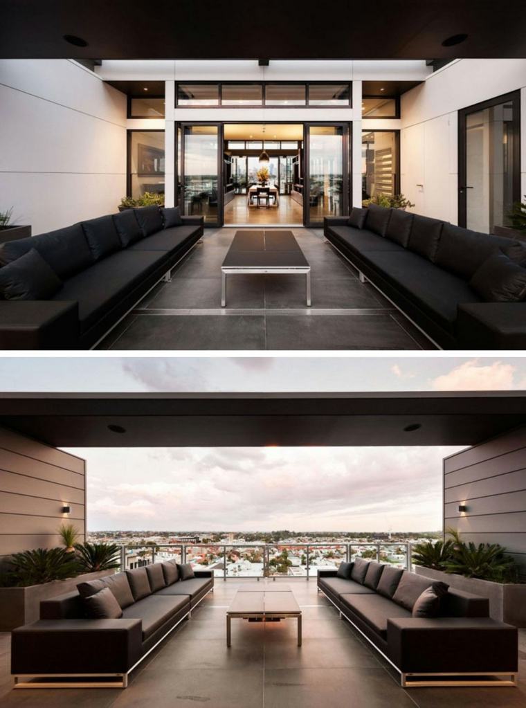 appartement dernier etage terrasse-piscine-exterieure-melbourne-australie-piece-canapes-noirs