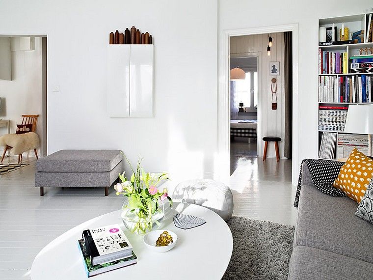 design suédois moderne canapé gris tapis sol table basse salon