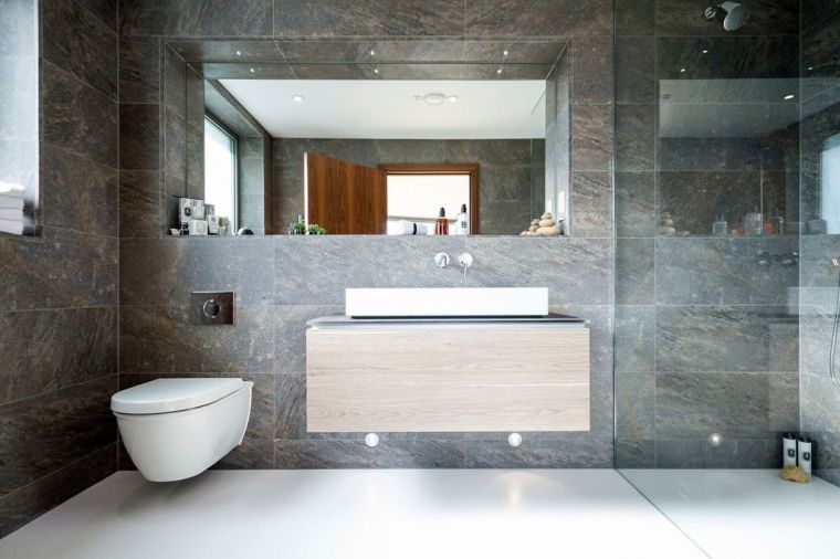 salle-de-bain-wc-toilettes-suspendues-revetement-pierre-noire