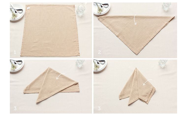 plier-une-serviette-en-tissu-decoration-de-table-image