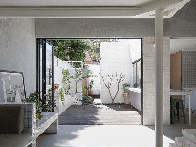maison en béton design terrasse idée plante banc déco