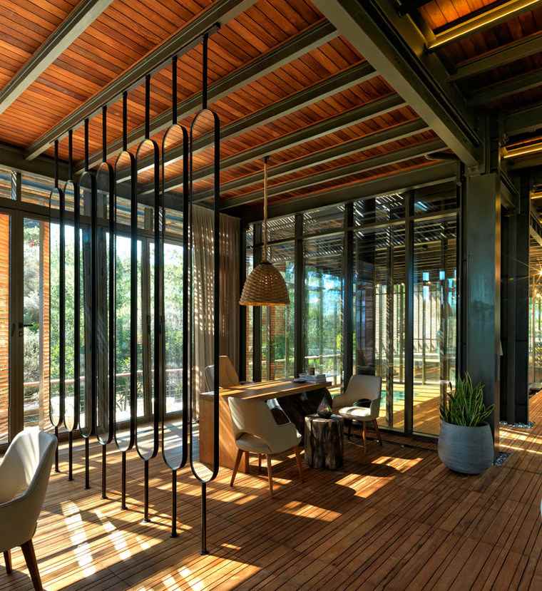 maison realisée sans impact-environnemental bois verre metal cuir