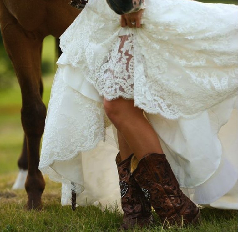 photo-de-mariee avec-bottes-et-cheval