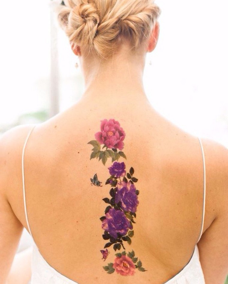 tatouage dos tatouage fleurs femme modèle