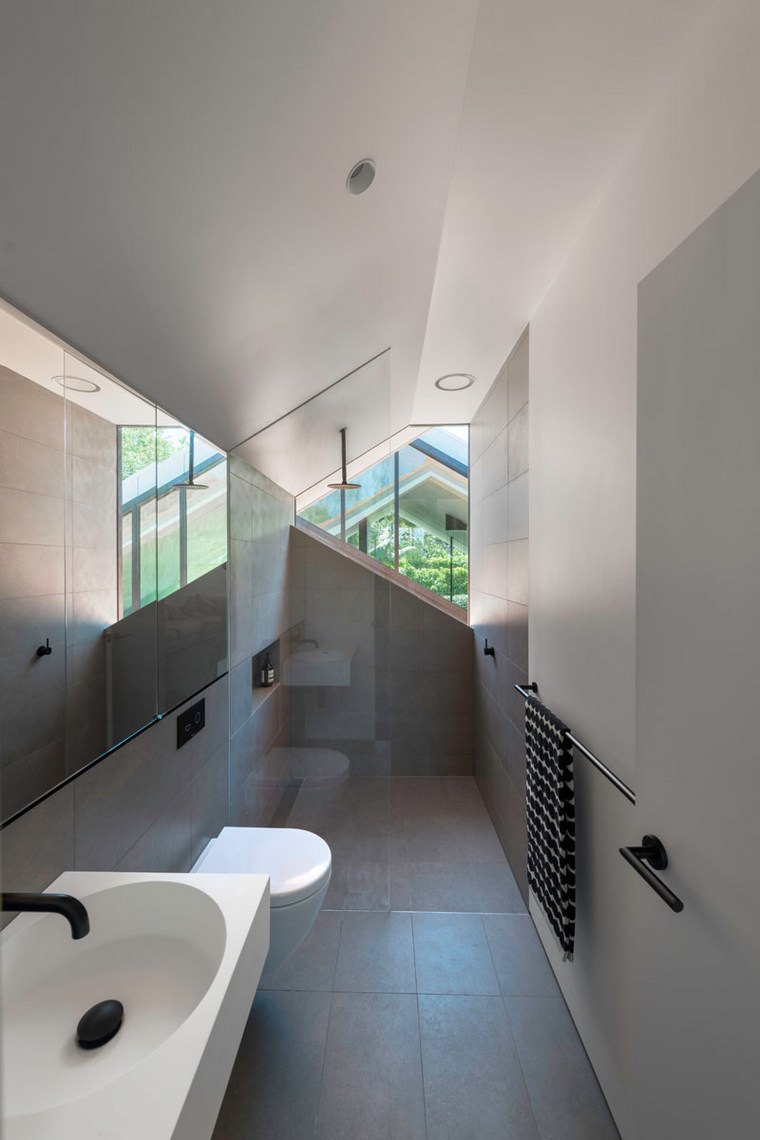 agrandissement maison bois extenstion béton MCK Architecture et intérieurs salle bain