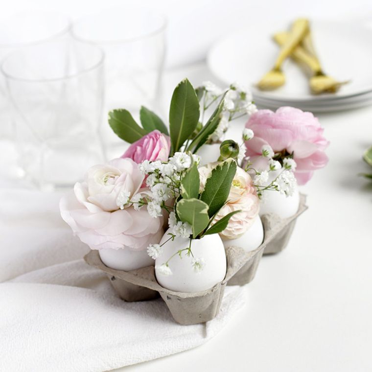 centre de table avec oeufs et fleurs