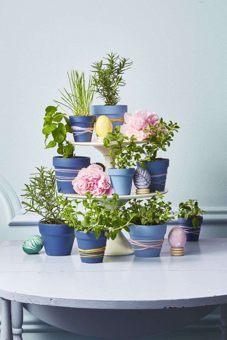 idée de centre de table avec pots de fleurs 