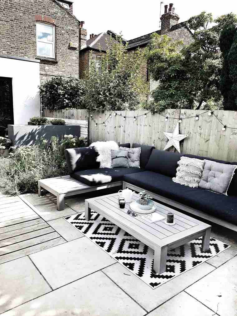 espace relax jardin moderne en noir et blanc 