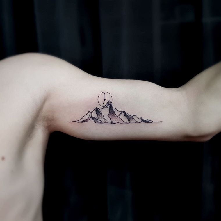 montagne tatouage original bras