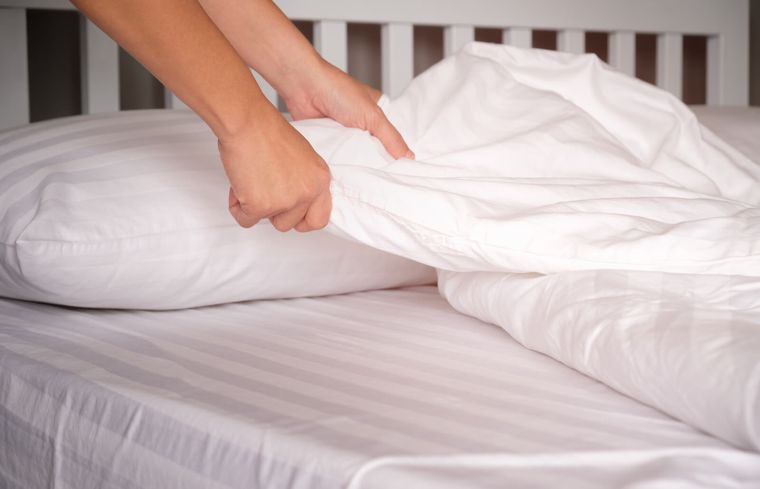 comment changer les draps du lit
