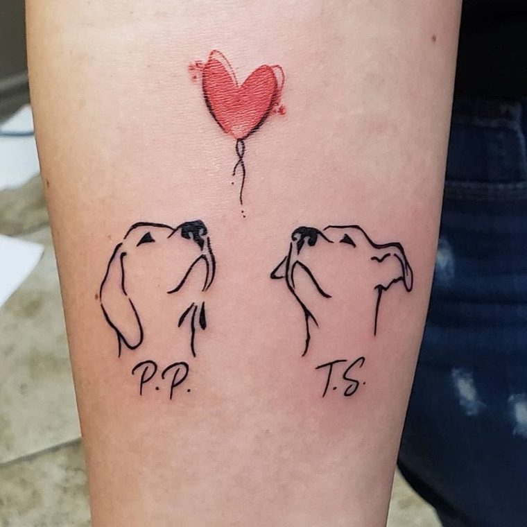 deux têtes de chien tatouage
