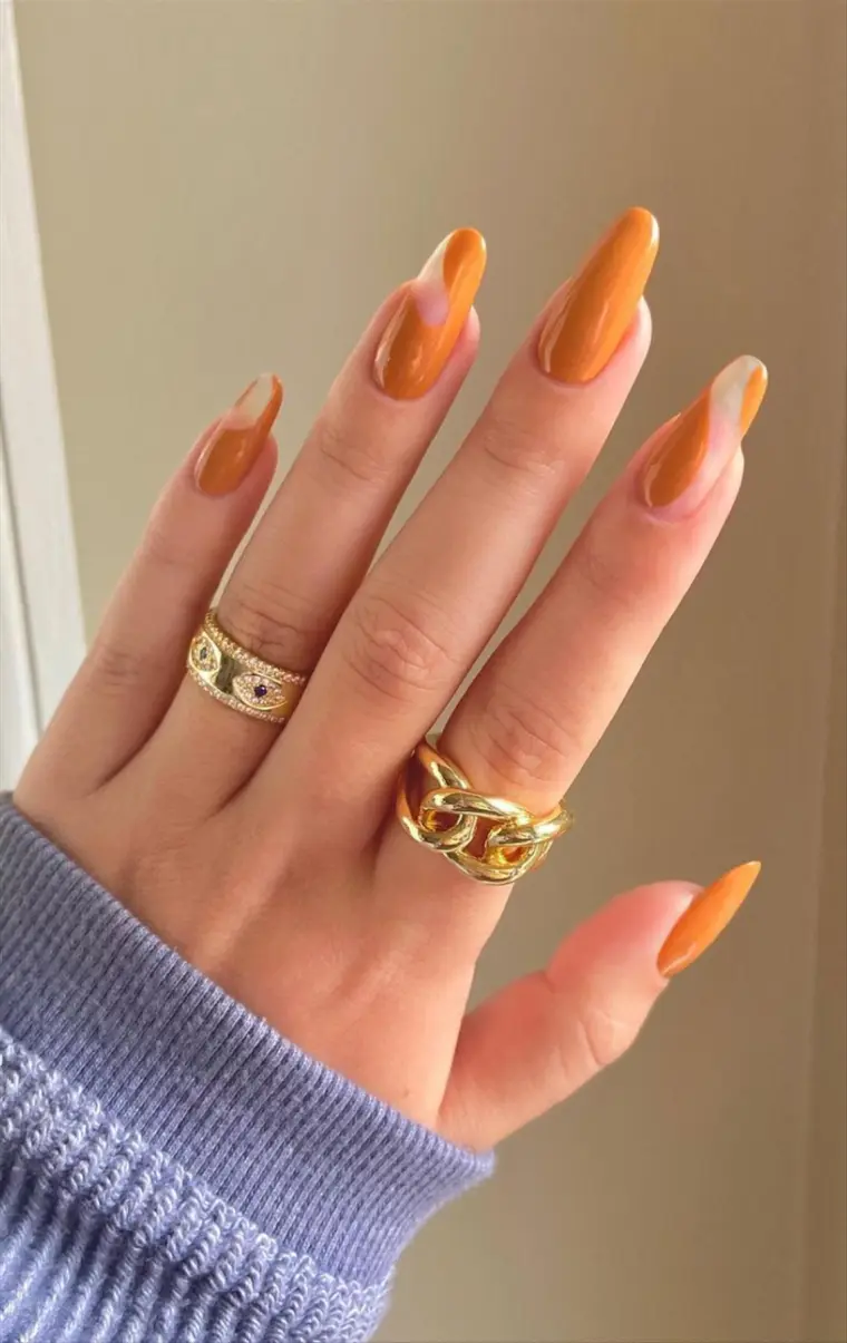 ongles vernis orange à la mode tendance manicure